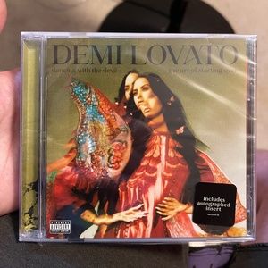 Signed/Autographed CD ‘Dancing with the Devil: TAOSO’ - Demi Lovato